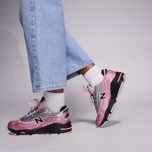New Balance M1000 unisex trainers in pink and silver are a stylish athletic shoe